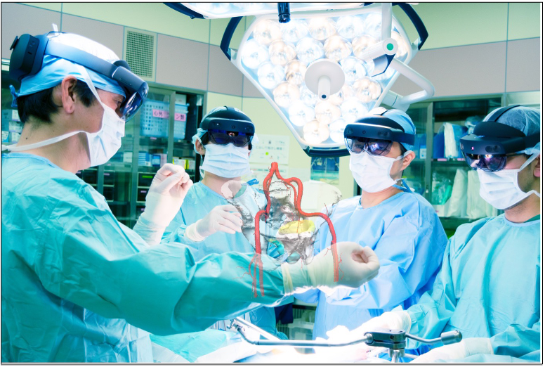 photo:Surgeons perform surgery while checking a patient’s organs and vessels in 3D with a VR headset